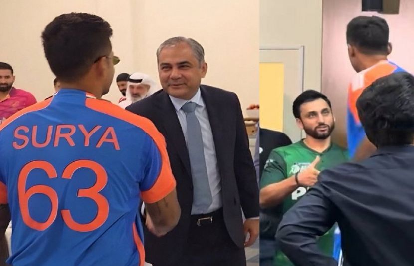 بھارتی کپتان اے سی سی صدر محسن نقوی سے ہاتھ ملاتے ہوئے